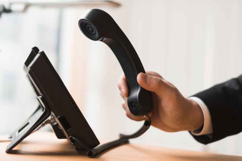 businessman-holding-headset
