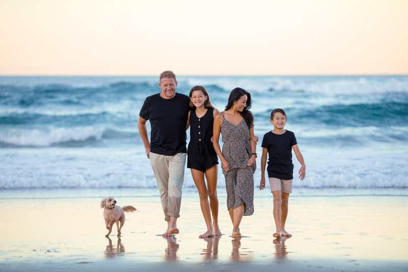 family-enjoying-together-in-beach